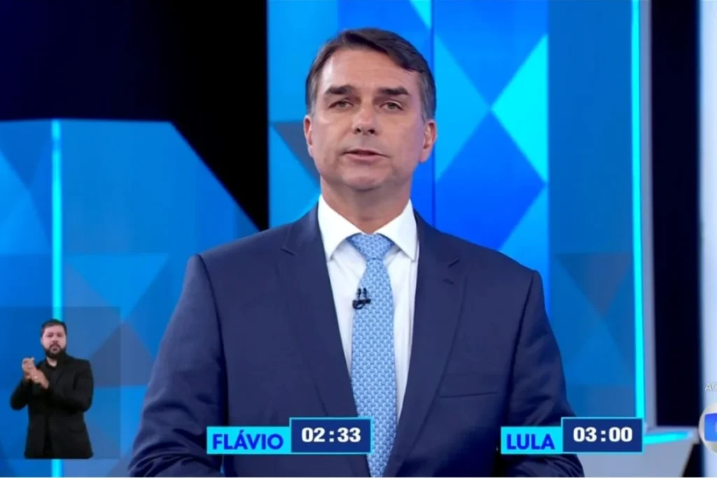 Debate: Flávio Bolsonaro promete reajustar salário mínimo acima da inflação